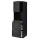 A tall black ikea METOD kitchen unit with drawers and open shelves.