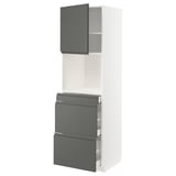 Modern white kitchen unit with gray drawers and a single gray cabinet door.