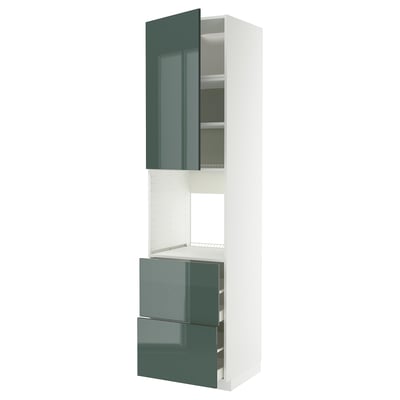 Modern white and green kitchen cabinet with high-gloss doors, drawers, and open shelves, featuring a sleek and contemporary design.