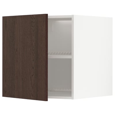 An open METOD kitchen cabinet with dark brown sinarp wood doors, white interior, and adjustable shelves.