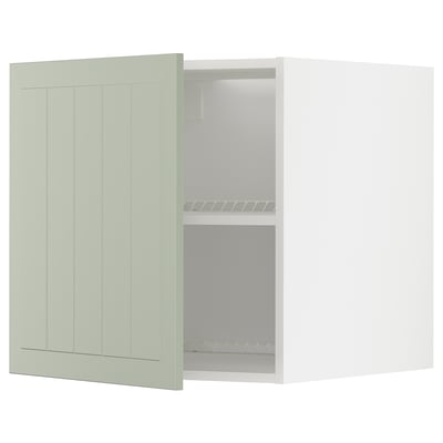 Green METOD kitchen cabinet with adjustable shelves.