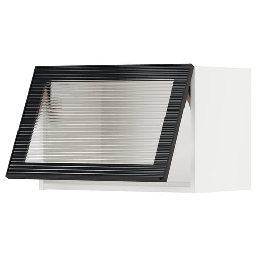 Modern black kitchen cabinet with sleek glass door featuring vertical reeded texture.