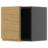 Wooden cabinet with grey box, open door, oak finish.
