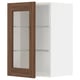 METOD walnut brown cabinet with glass shelves.