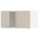A beige METOD kitchen cabinet, featuring smooth, sleek doors with a modern design.