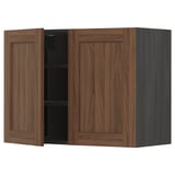 A brown METOD kitchen wall cabinet with one door open, revealing shelves inside.