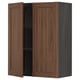 An ikea METOD kitchen cabinet with walnut finish. It two wooden doors, with one open revealing a black interior and a shelf.