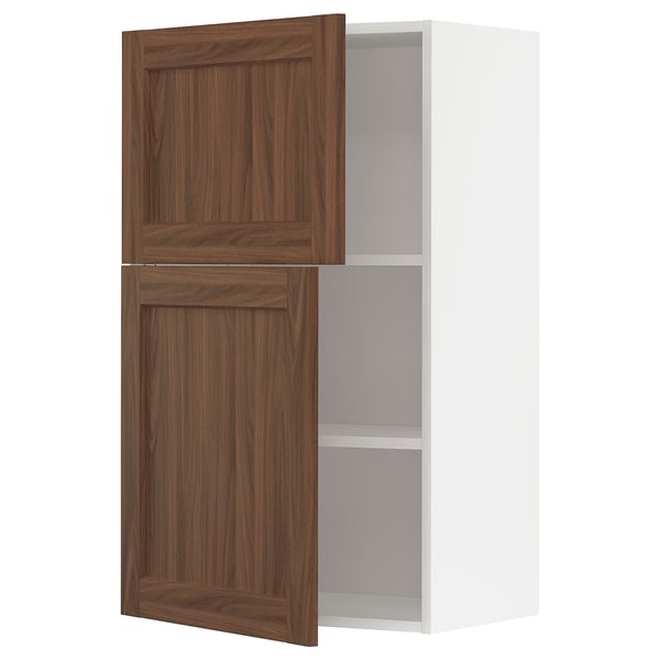 METOD kitchen cabinet with walnut-look doors and adjustable shelves.