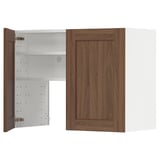 A wooden METOD kitchen cabinet with an open door revealing white shelves. It a walnut finish, adjustable shelves, and a modern design.