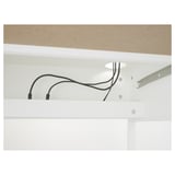 Under-shelf cable management with visible wiring.