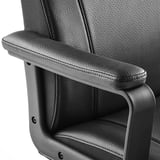 Close-up of a modern office chair with padded armrest, featuring high-quality upholstery and intricate stitching for comfort and durability.