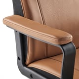 Office chair with padded armrests, brown upholstery, sturdy frame.