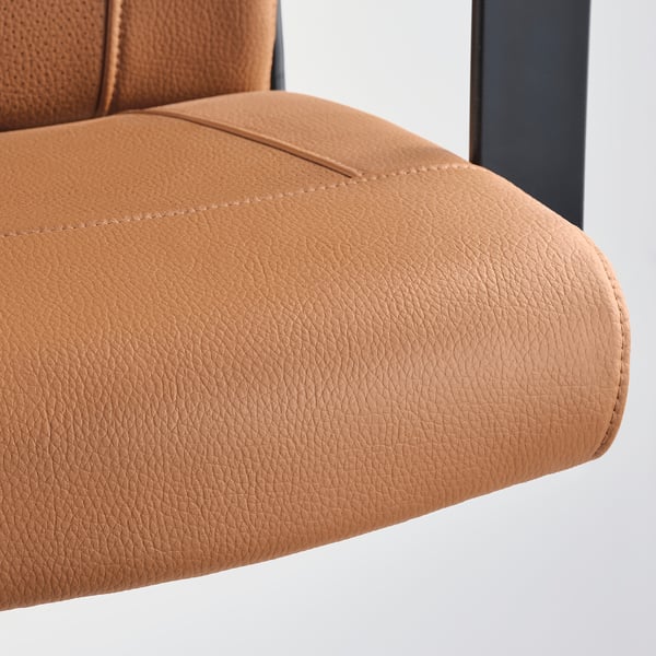 Close-up of MILLBERGET swivel chairs cushioned seat, showing high-quality orange-brown fabric and meticulous stitching.