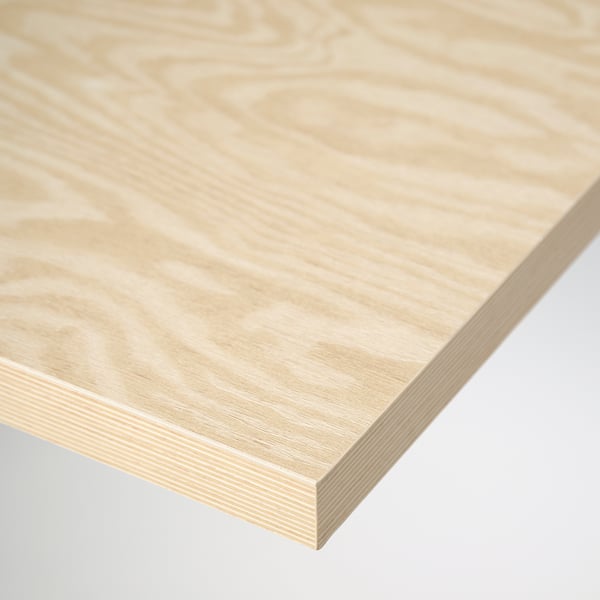 Close-up of a sleek, light-colored table top with a smooth, honeycomb-patterned edge band, highlighting its quality construction and design.