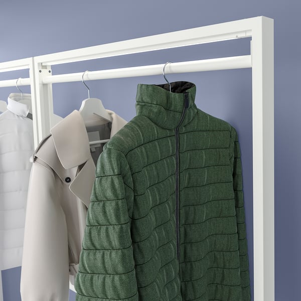 MITTZON clothed rack displays green jacket, gray coat, and white shirt on hangers, ideal for organizing outerwear.