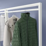 MITTZON clothed rack displays green jacket, gray coat, and white shirt on hangers, ideal for organizing outerwear.
