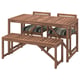 Brown acacia wood outdoor table, bench, and two chairs. Stripes on cushions.