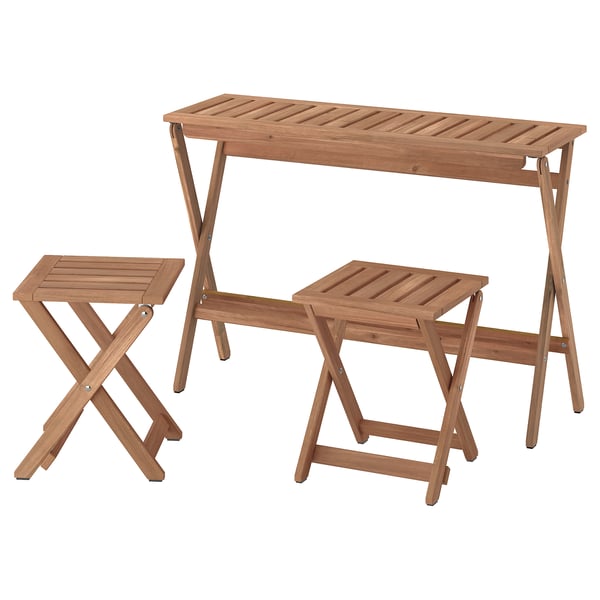 IKEA NÄMMARÖ outdoor table and two chairs, natural wood color, rectangular design.