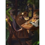 Rustic brown NÄMMARÖ patio table with drinks, fruit & candle
