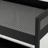 Black metal trolley with perforated shelf, sturdy and mobile.