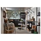 Industrial chic trolley with shelves for storage, ideal kitchen or workspace. Black powder-coated steel, four wheels.