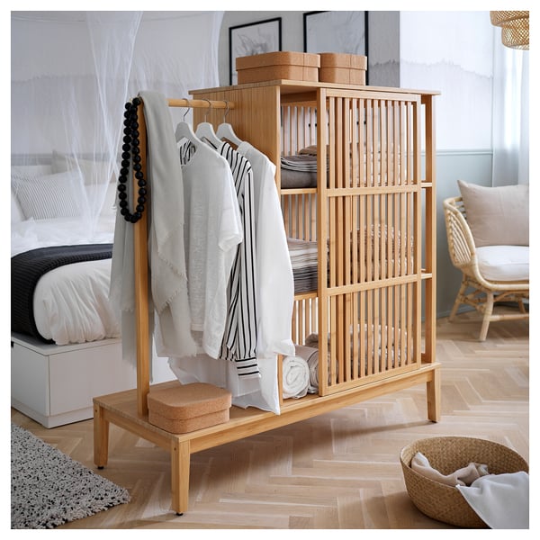 NORDKISA wooden wardrobe with striped shelves, light brown, rectangular, minimalist design.