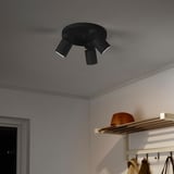 Black ceiling light with three adjustable spotlights.