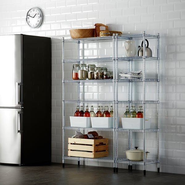 Kitchen storage shelf with jars, bottles, and containers. Organized and adjustable, sturdy and visible contents.