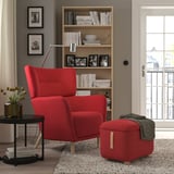 Red OSKARSHAMN wing chair & stool: cozy, high-back design; perfect for reading nook.