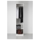 Open wardrobe with clothes and bags. Hinges and dampers for smooth door closure.