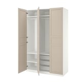 An open beige ikea PAX wardrobe with shelves and racks.