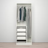 A compact wardrobe with a hanging rack and drawers. The wardrobe has a side compartment for long garments, optimizing storage space.