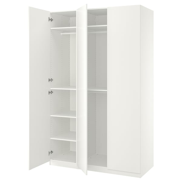 Displays an open white ikea PAX wardrobe with empty shelves and a hanging rail.