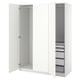 An open white IKEA PAX wardrobe with shelves and drawers.