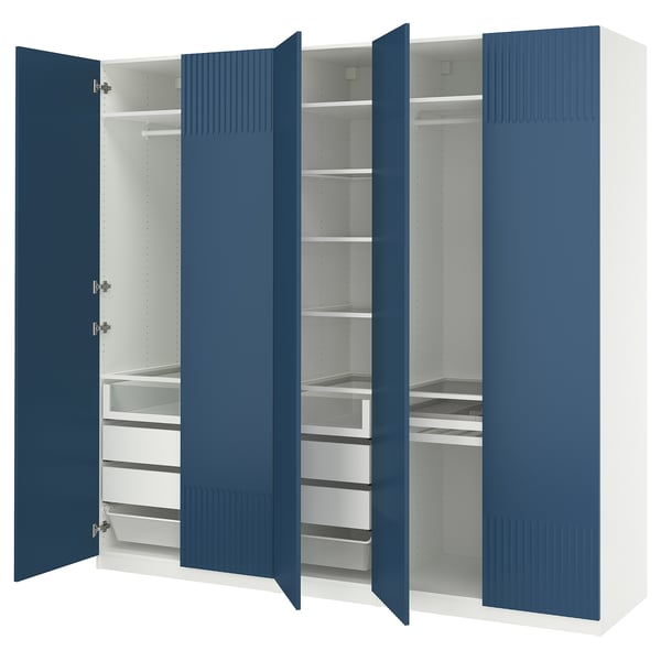 A blue and white PAX wardrobe with open doors, revealing shelves, drawers, and organizers inside.