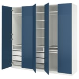 A blue and white PAX wardrobe with open doors, revealing shelves, drawers, and organizers inside.