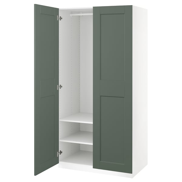A white and green PAX wardrobe with open doors revealing interior shelves.