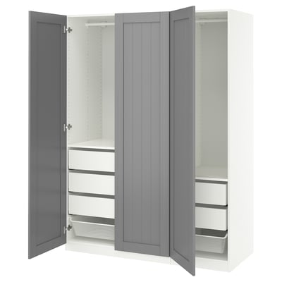White PAX wardrobe with grey doors, open showing shelves and drawers.