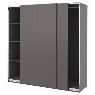 A gray PAX wardrobe with three sliding doors and shelves inside.