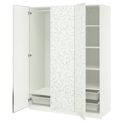 A white PAX wardrobe with floral-patterned doors and adjustable shelves including mesh drawers.