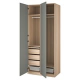 PAX wardrobe, light wood tone, blue doors open, three drawers, shelves, and hanging rod.