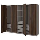 An open ikea PAX wardrobe in dark brown with shelves and drawers. It has a wooden finish and modern design.