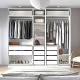 Organization at its finest: PAX wardrobe hanging clothes, folded items, shoes, and accessories, offering a neat and sorted look.
