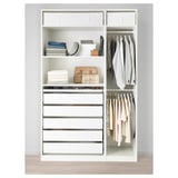 White wardrobe with drawers, shelves, and hanging space for clothes. Organized with folded clothes, handbags, and boxes.
