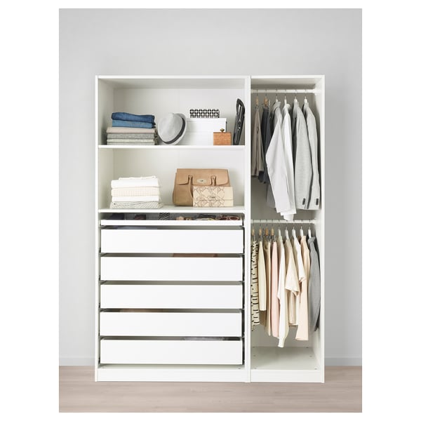 Modern white wardrobe with shelves, drawers, and hanging space for clothes and accessories.