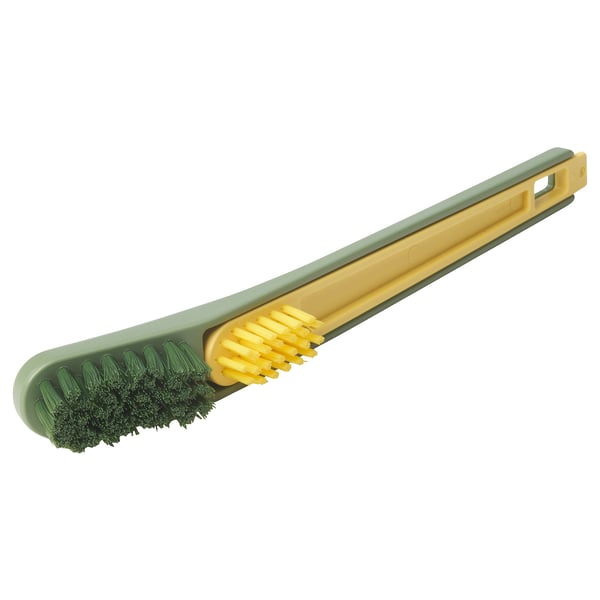 Green & yellow shoe brush with scraper, polyester bristles, ergonomic handle.