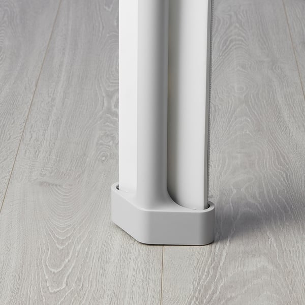 Modern mop with durable, lightweight handle, stable base, resting on stylish wooden floor.