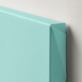 Light blue canvas print with vivid color, wrapped around a deep, sturdy frame, mounted on a wall.