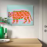 PJÄTTERYD canvas print, light blue, colorful cheetah, kitchen decoration, near green vase.