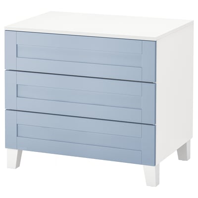 A stylish PLATSA chest with three light blue drawers and white legs. The modern design sleek lines.